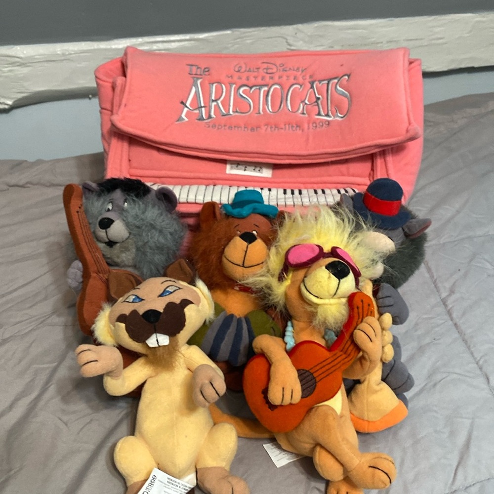 Aristocrats beanie baby’s with piano storage